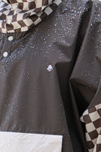 Poncho court Damier Kaki