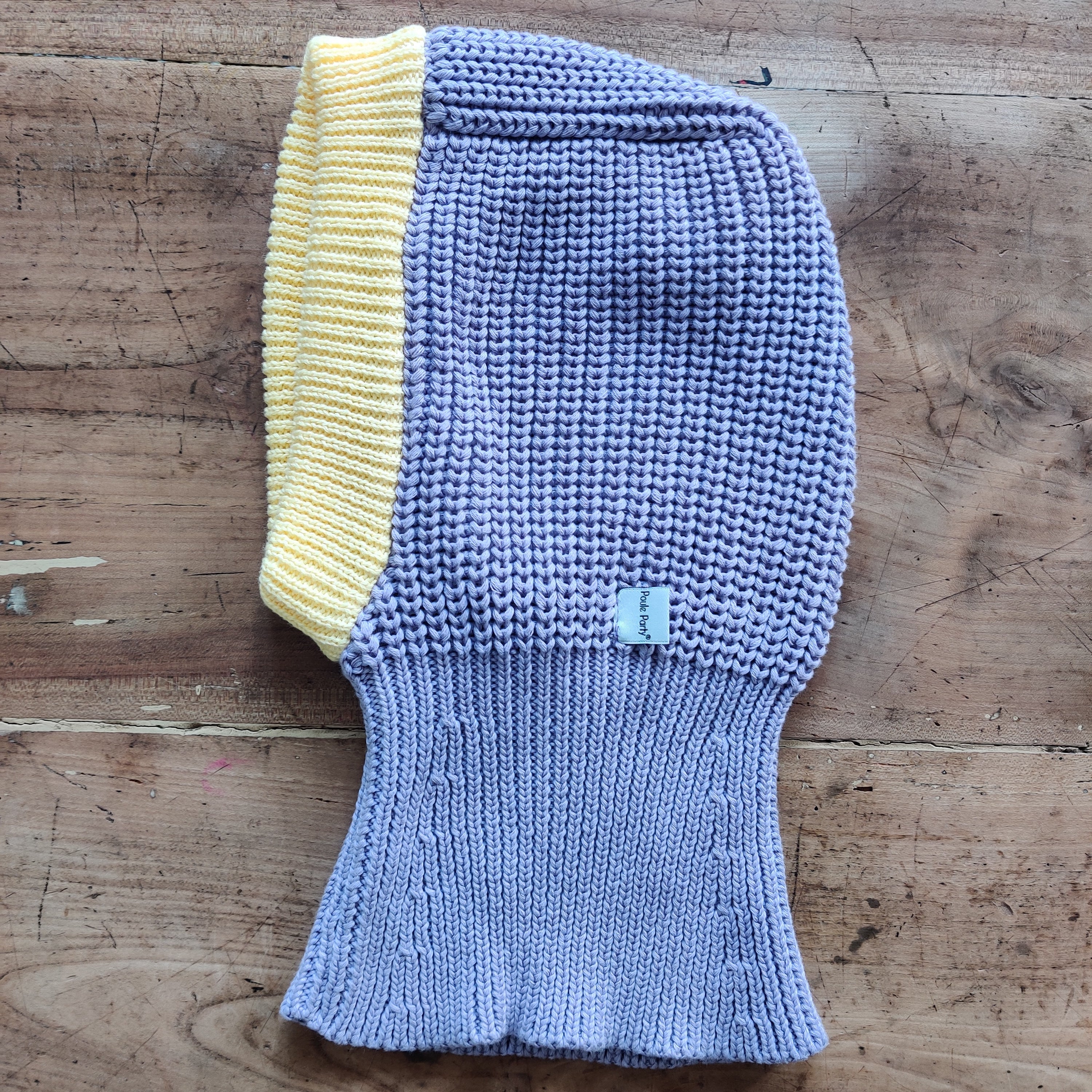 Cagoule lila et jaune crème